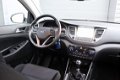 Hyundai Tucson - 1.6 GDi Comfort | Navigatie | Trekhaak | Climate control | - 1 - Thumbnail
