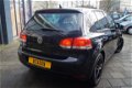 Volkswagen Golf - 1.2 TSI Comfortline BlueMotion / Navi / Xenon / Open-Dak / PDC - 1 - Thumbnail