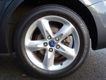 Ford Focus Wagon - 1.6 Comfort 1ste eig., Airco, Lcihtm. velg - 1 - Thumbnail