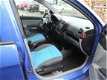 Kia Picanto - 1.0 EX Sport Airco, L.M.velgen, 5 drs, cd speler, dak spoiler - 1 - Thumbnail