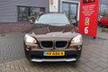 BMW X1 - SDrive18i Airco / Elek. ramen / Radio - 1 - Thumbnail