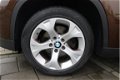 BMW X1 - SDrive18i Airco / Elek. ramen / Radio - 1 - Thumbnail