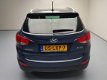 Hyundai ix35 - 2.0i i-Catcher Airco Ecc Navi Pano Dak Lm Velgen 1900 Kg Trekgewicht, Cruise Lm velge - 1 - Thumbnail