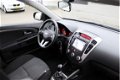 Kia Cee'd - 1.4 CVVT X-ecutive Navigatie/Airco/Cruise controle - 1 - Thumbnail