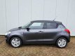 Suzuki Swift - 1.2 Smart Hybrid Select All-in prijs - 1 - Thumbnail