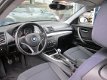 BMW 1-serie - 116i Executive NAP Airco/PDC/Stoelverwarming/Ketting nieuw/Start stop/Nieuwstaat - 1 - Thumbnail