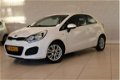 Kia Rio - 1.2 CVVT Comfort Pack * Navi/ Velgen/ Elek Pakket/ Airco - 1 - Thumbnail