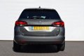 Opel Astra Sports Tourer - 1.4T 150 pk Online Edition | Navigatie | AGR stoelen | PDC v+a - 1 - Thumbnail