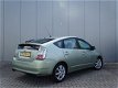 Toyota Prius - 1.5 VVT-i Comfort | Automaat | Climate Control | Cruise Control | - 1 - Thumbnail