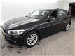 BMW 1-serie - 118i Centennial Executive Navigatie, Ecc, Pdc, Led verl, Sport Stoelen, Lv - 1 - Thumbnail