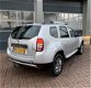 Dacia Duster - 1.2 TCe 4x2 10th Anniversary Hoge Zit 2015 km 61.000 Nap 1e eigenaar - 1 - Thumbnail