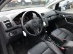 Volkswagen Touran - 1.2 TSI Highline LEDER & NAVIGATIE & PRIVACY GLASS - 1 - Thumbnail