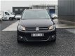 Volkswagen Touran - 1.2 TSI Highline LEDER & NAVIGATIE & PRIVACY GLASS - 1 - Thumbnail