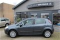 Fiat Punto Evo - 1.4 77PK Airco, Trekhaak, Usb, Mistlamp - 1 - Thumbnail