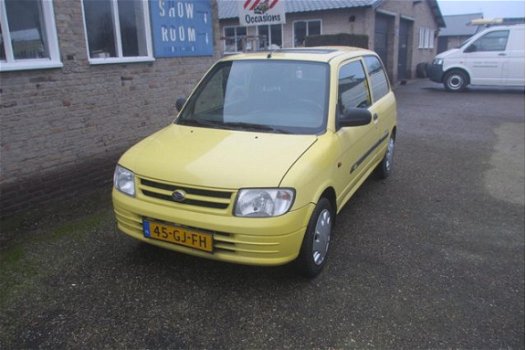 Daihatsu Cuore - 1.0-12V STi - 1