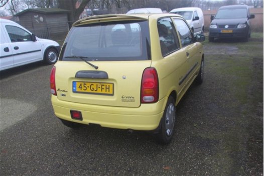 Daihatsu Cuore - 1.0-12V STi - 1