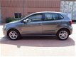 Volkswagen Polo - 1.2-12V Comfortline Airco, LMV, Elek-pakket, Cruise control - 1 - Thumbnail