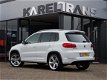 Volkswagen Tiguan - 1.4 TSI Sport&Style 4motion R-line | panoramadak | parkeercamera | leder | xenon - 1 - Thumbnail