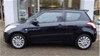 Suzuki Swift - 1.2 BANDIT EASSS Airco | Cruise | Stoelverwarming - 1 - Thumbnail