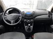 Hyundai i10 - 1.1 i-Drive Cool (Airco / Elektrische ramen / Stuurbekr.) - 1 - Thumbnail