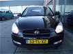 Hyundai Accent - 1.4i Dynamic First Edition - 1 - Thumbnail