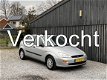 Ford Focus - 1.4-16V Ambiente | Airco | Schuif-/kanteldak | Achteruitrijcamera | Trekhaak | APK tot - 1 - Thumbnail