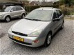 Ford Focus - 1.4-16V Ambiente | Airco | Schuif-/kanteldak | Achteruitrijcamera | Trekhaak | APK tot - 1 - Thumbnail