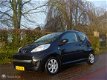 Peugeot 107 - ( 98.714 KM ) Bwj 2011 APK 12-2020 DE MEEST LUXE - 1 - Thumbnail