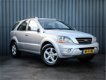 Kia Sorento - 2.5 CRDi Adventure, Automaat, Airco, Cruise Control, Trekhaak, NL-Auto - 1 - Thumbnail