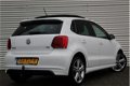 Volkswagen Polo - 1.2 TSI 90pk Highline R-Line / Panorama / Xenon / Navi / Trekhaak - 1 - Thumbnail