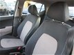 Hyundai i10 - 1.0i i-Motion airco/zuinig/hoge instap/5-deurs/a-label - 1 - Thumbnail