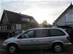 Chrysler Grand Voyager - 3.3i V6 SE Luxe stow en go 7 persoons automaat - 1 - Thumbnail