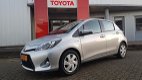 Toyota Yaris - 1.5 Hybrid 100PK Aspiration | Navi | Sensoren achter - 1 - Thumbnail