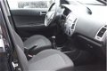 Hyundai i20 - 1.2i i-Drive (78pk) 5-Drs /Airco /Elek. ramen + Spiegels /C.V. afstand /Radio /AUX&USB - 1 - Thumbnail