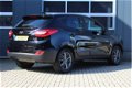 Hyundai ix35 - 1.6i GDi Business | Navigatie | Achteruitrijcamera | Climate control | Cruise control - 1 - Thumbnail