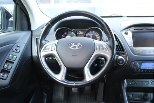 Hyundai ix35 - 1.6i GDi Business | Navigatie | Achteruitrijcamera | Climate control | Cruise control - 1