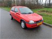 Opel Corsa - 1.2i-16V Onyx Nieuwe apk 1ste eigenaar 78000km Nap - 1 - Thumbnail