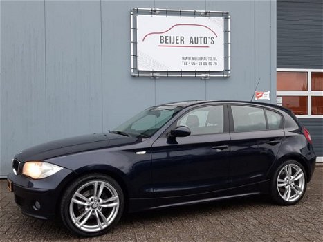 BMW 1-serie - 120i High Executive 18inch/Leer/Navigatie/Climate - 1