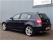 BMW 1-serie - 120i High Executive 18inch/Leer/Navigatie/Climate - 1 - Thumbnail