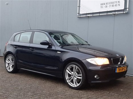 BMW 1-serie - 120i High Executive 18inch/Leer/Navigatie/Climate - 1