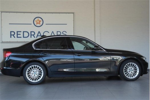 BMW 3-serie - 320i High Executive NL Auto NAP, Leer, Xenon, Navi - 1