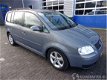 Volkswagen Touran - 2.0 16V FSI TRENDLINE - 1 - Thumbnail