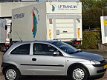 Opel Corsa - 1.2 16V Comfort Automaat, bj.2002, grijs metallic, NAP uitdraai met 138357 km.en APK to - 1 - Thumbnail