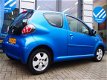 Toyota Aygo - 1.0-12V Dynamic Blue Airco (APK:Nieuw) Elek.Pakket - 1 - Thumbnail