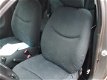 Toyota Yaris - 1.3 VVT-i Idols airco 3 deurs grijs - 1 - Thumbnail