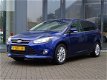 Ford Focus Wagon - 1.0 EcoBoost Titanium 125pk Navigatie, Climate&Cruise control, Voorruitverw, Rege - 1 - Thumbnail