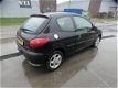 Peugeot 206 - 1.4 XS Premium / leer / alu. velgen / nieuwe distr. riem - 1 - Thumbnail