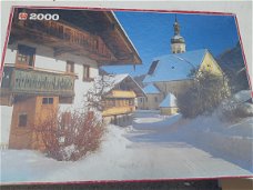 Puzzel van 2000 puzzelstukjes Zwitsers dorp