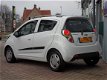 Chevrolet Spark - 1.0 16V LE Airco | Hoogzit - 1 - Thumbnail