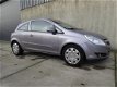 Opel Corsa - 1.2-16V Enjoy airco, cruise control - 1 - Thumbnail